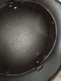 Coque casque Allemand WW2 M40 avec son cerclage.