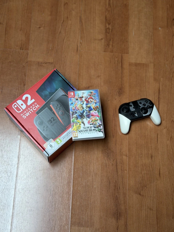 Nintendo Switch 2 + Manette Switch Pro( édition Super Smash Bros) + Jeu