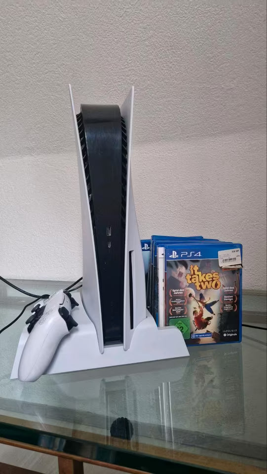 PlayStation 5 avec 2 manettes + station de charge + 5 jeux
