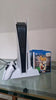 PlayStation 5 avec 2 manettes + station de charge + 5 jeux