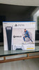 PlayStation 5 avec 2 manettes + station de charge + 5 jeux