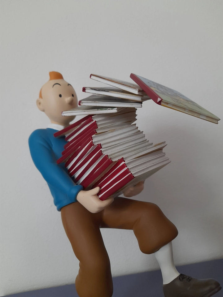 Statuette "Tintin Tenant les Albums". Réf 46964. Authentique avec certificat.