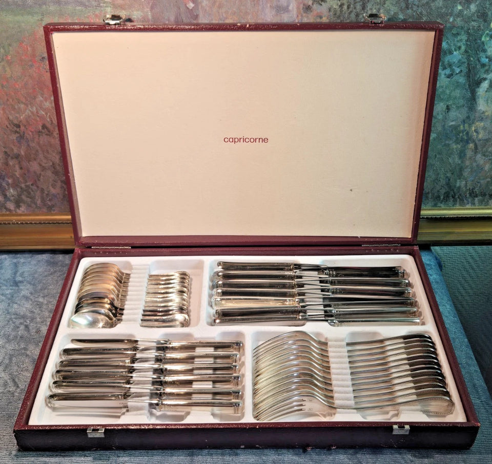 ménagère en métal argenté CHRISTOFLE / Modèle MALMAISON 47 pièces
