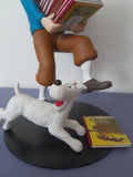Statuette "Tintin Tenant les Albums". Réf 46964. Authentique avec certificat.