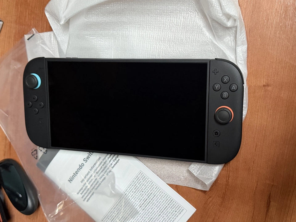 Nintendo Switch 2 + Manette Switch Pro( édition Super Smash Bros) + Jeu