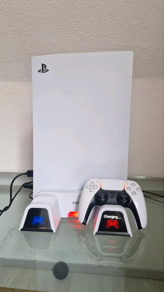 PlayStation 5 avec 2 manettes + station de charge + 5 jeux