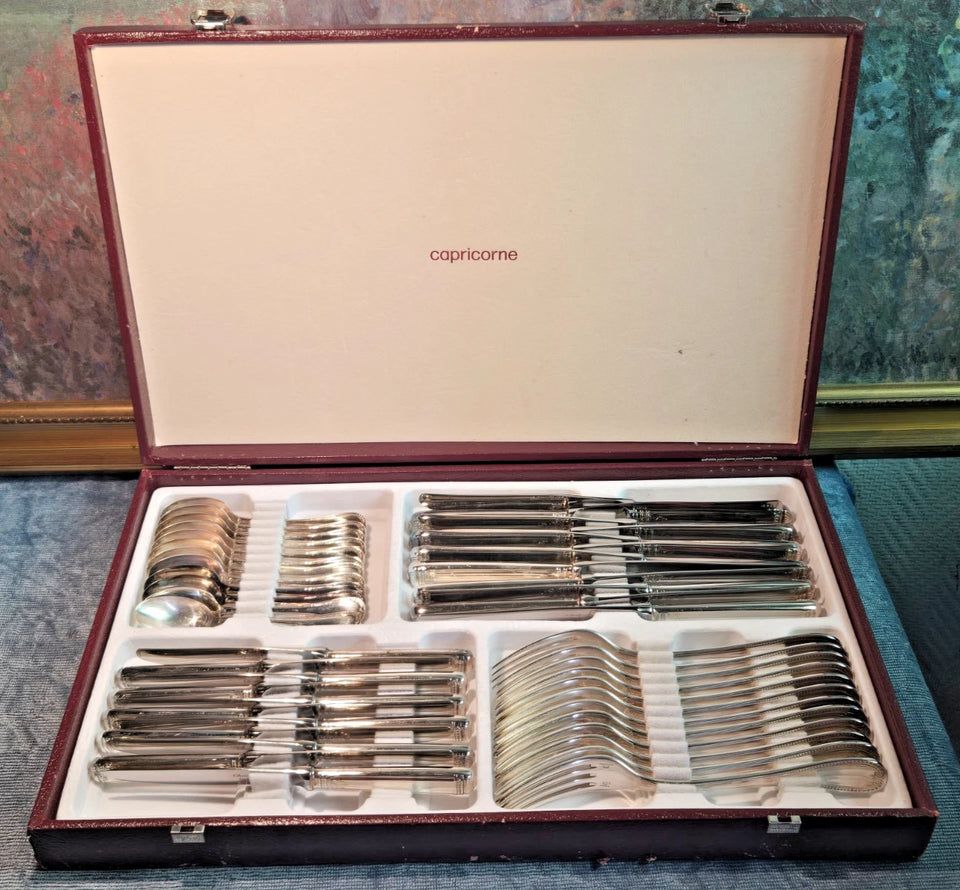 ménagère en métal argenté CHRISTOFLE / Modèle MALMAISON 47 pièces