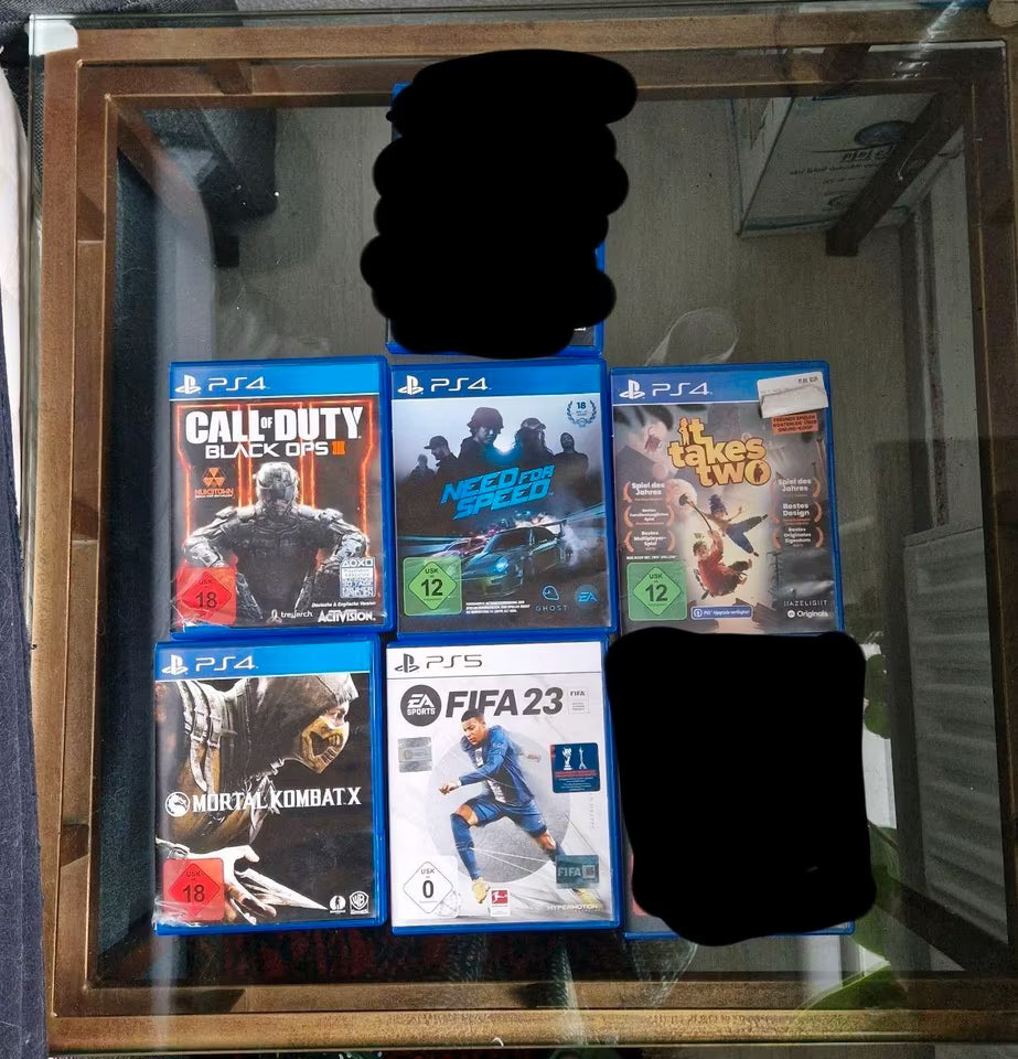 PlayStation 5 avec 2 manettes + station de charge + 5 jeux