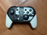 Nintendo Switch 2 + Manette Switch Pro( édition Super Smash Bros) + Jeu